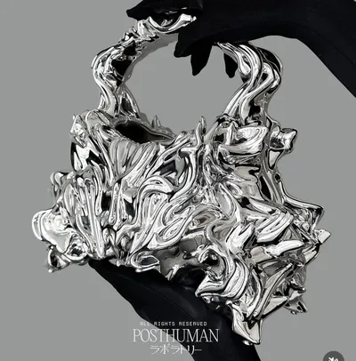 Chrome-finish sculptural bag from the Posthuman Lab collection